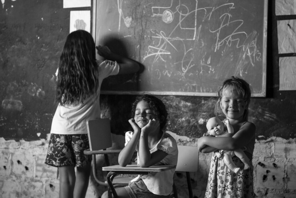Children engaged in play and learning in a rural Brazilian classroom setting.
